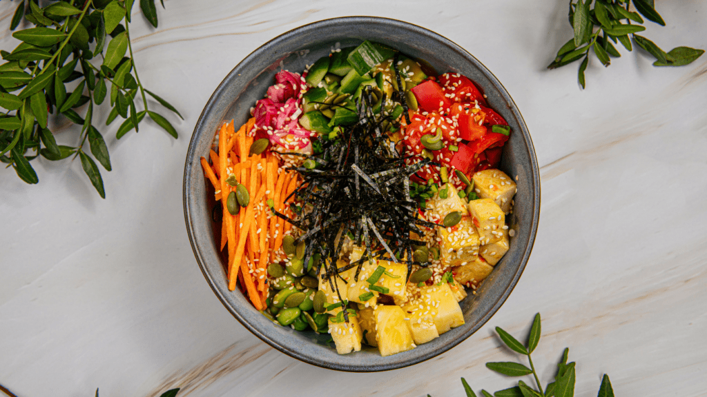 a bowl filled with vegetables and other ingredients