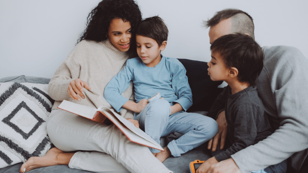 mother Reading a book to her kids