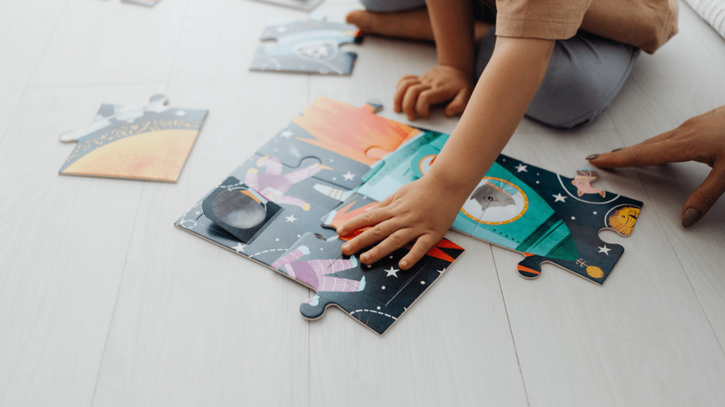 a child playing with puzzle