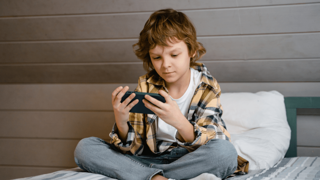 a kid using an smartphone