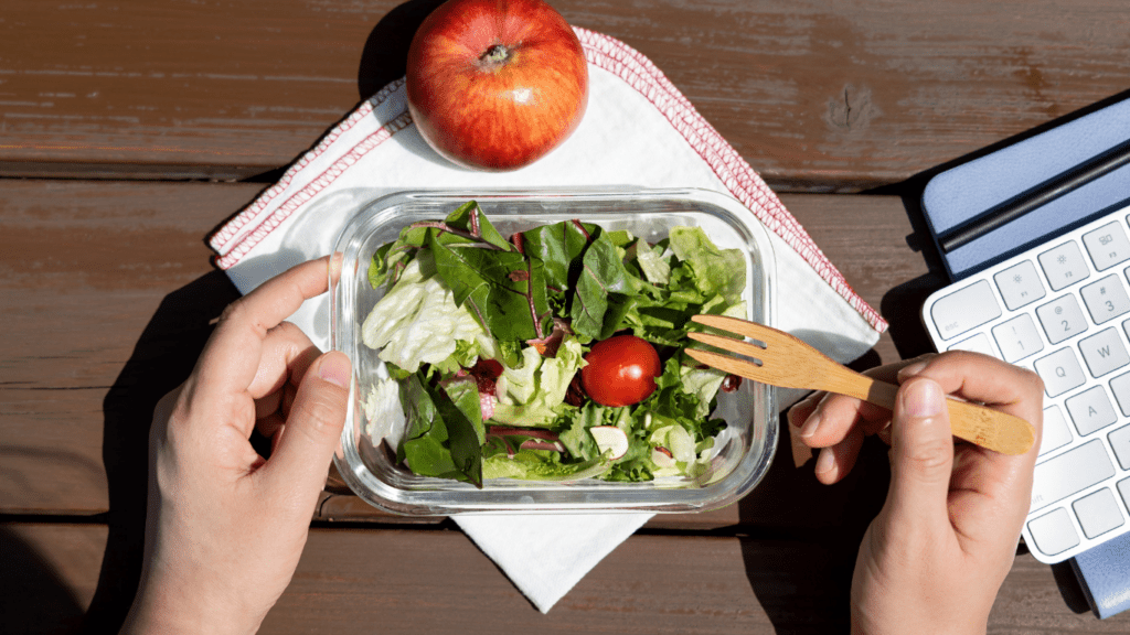 a person eating a salad