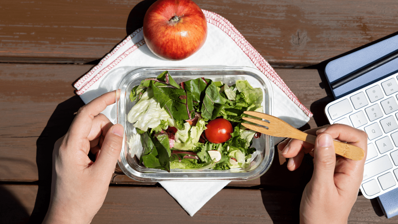 a person eating a salad