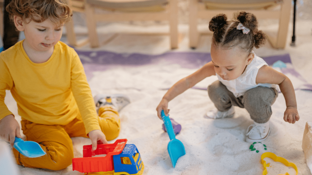 two children playing in the living room