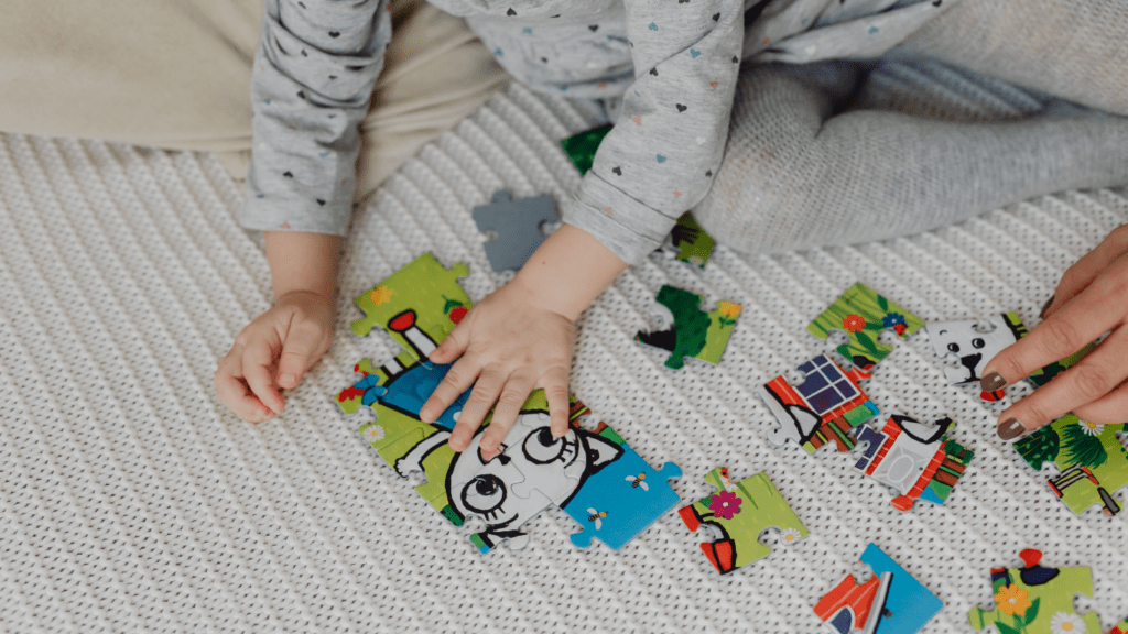 a child playing with puzzle