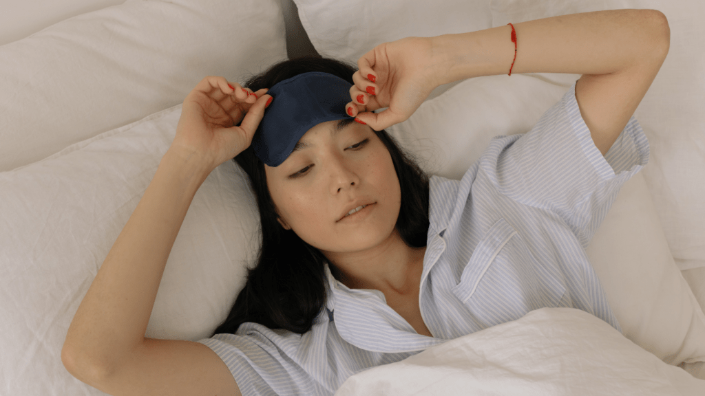 a girl sleeping in her bedroom