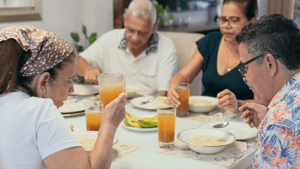 blended family eating in the table