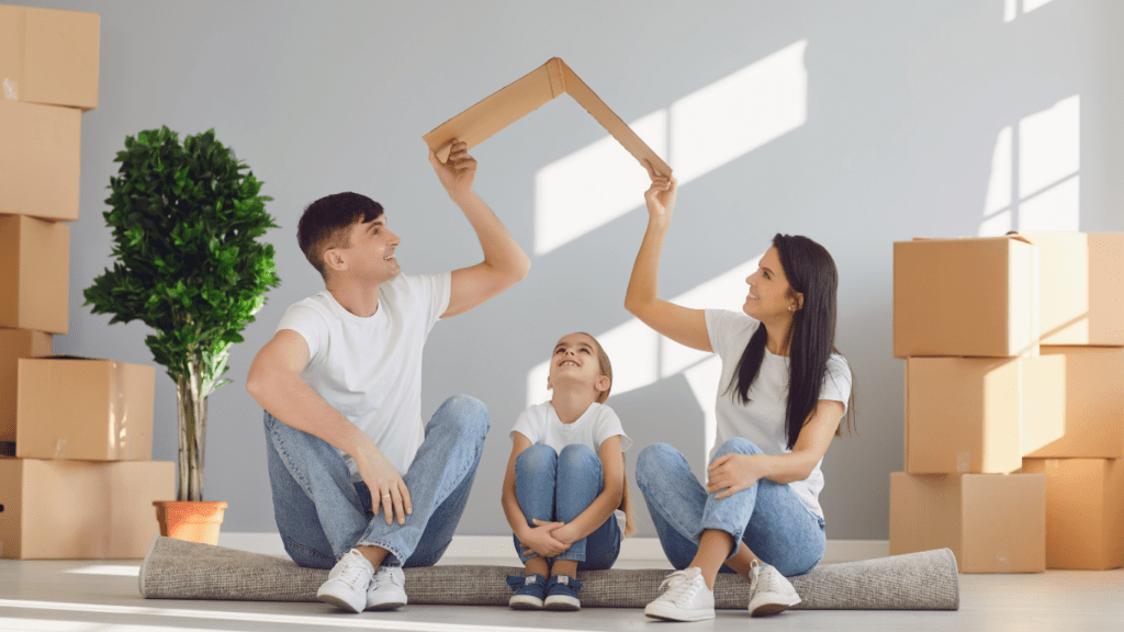 a family is sitting on the floor