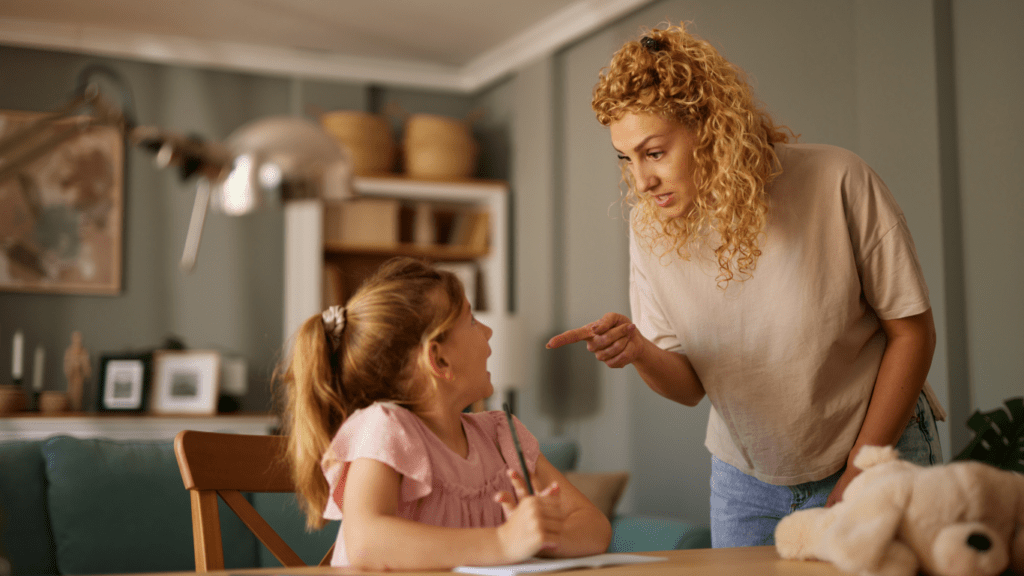 mother scolding her daughter