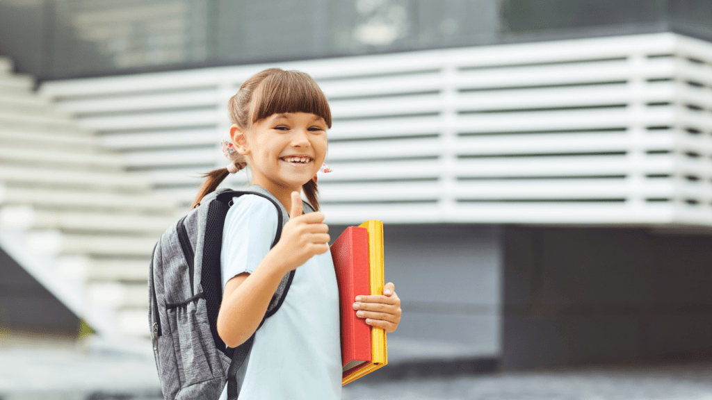 small girl going to school