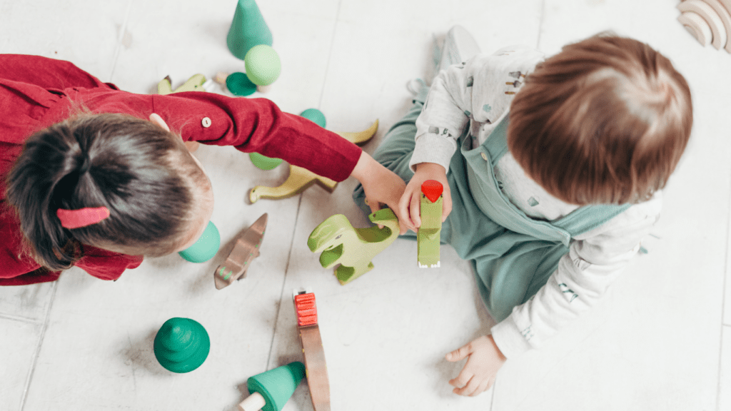 two children playing in the living room