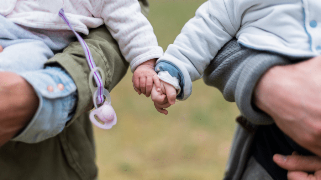 two people holding hands